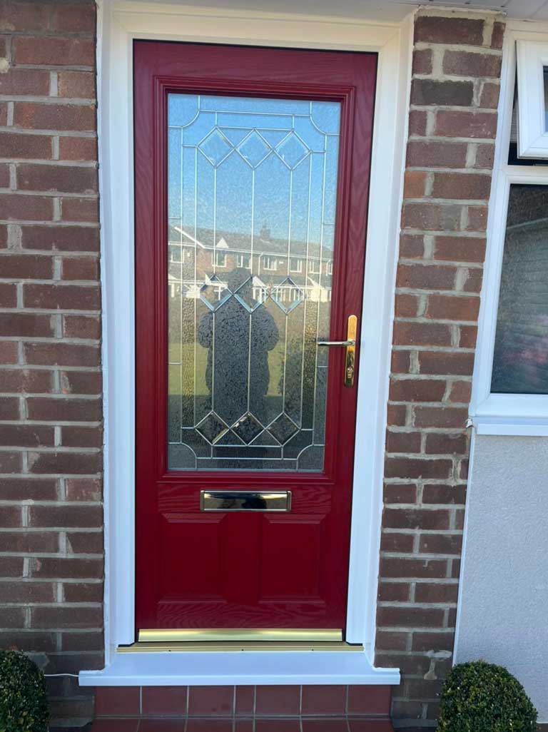Red composite door frame with half glass