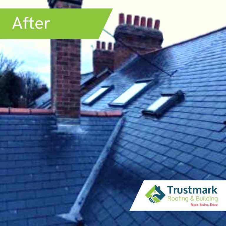 After photo of a completed chimney repair in Northumberland with repointed brickwork, new lead flashing, and fully restored slate roofing for improved structural integrity.