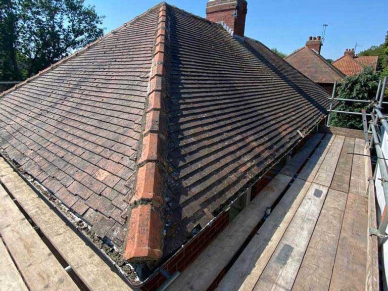 Damaged roof before repair in Harton