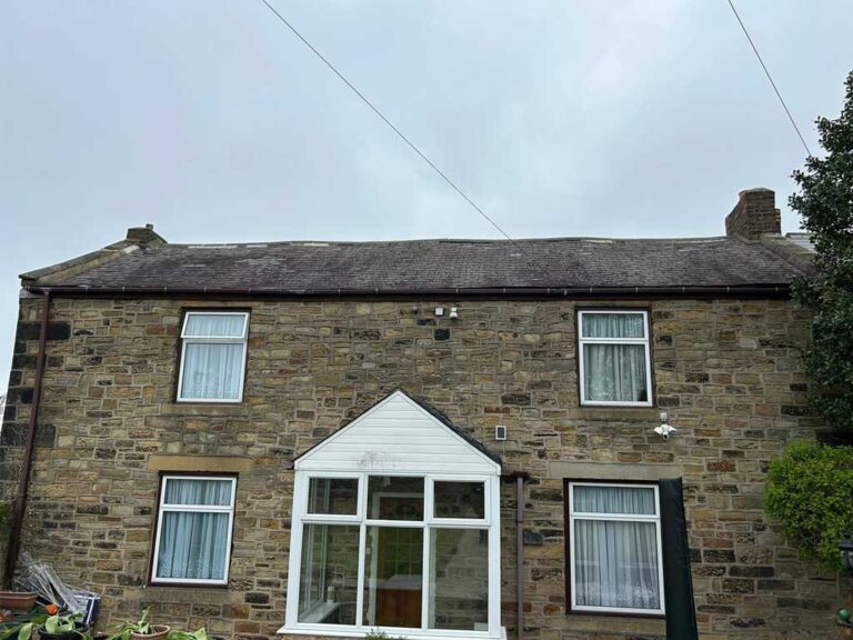 Worn roof prior to replacement in Simonside