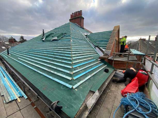 Broken slate roof before repair