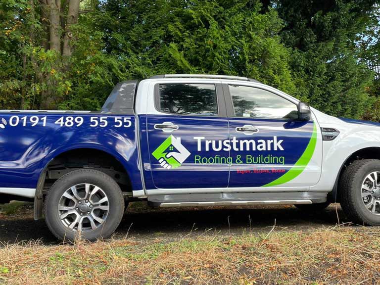 Trustmark Roofing & Building response vehicle ready for emergency roofing services.