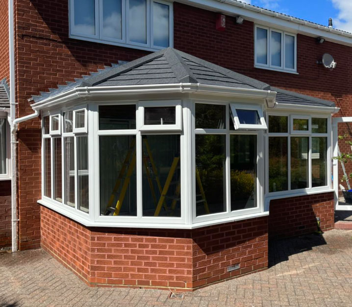 Guardian approved installation team fitting a warm roof system in Gateshead.