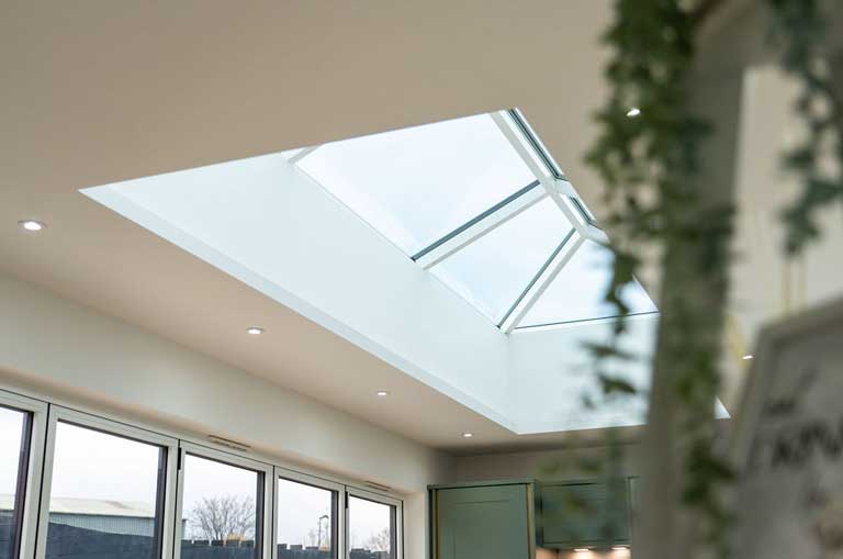 Guardian home extension roof cut out during installation showing structural opening and roof depth