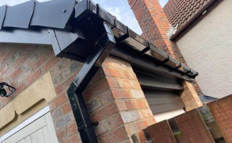 new UPVC guttering and downpipe installation on a Gateshead property