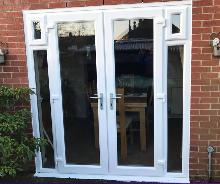 French patio doors opening onto a Gateshead garden