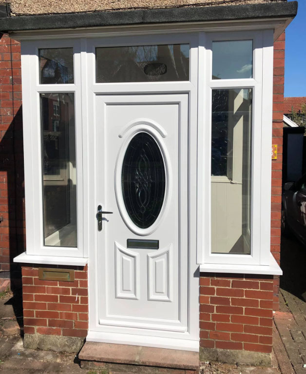 white UPVC door with windows either side